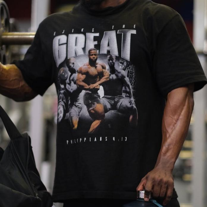 Ejike wearing 4:13 tshirt
