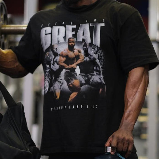 Ejike wearing 4:13 tshirt